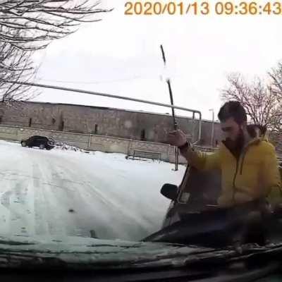 Driving in snow goes wrong, luckily the guy turns out to be a jolly cat!