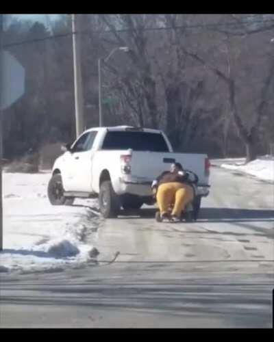 Woman is towed in Kansas City