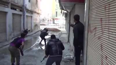 Syrian rebel almost gets hit 4 times in urban warfare (2012 - Daraa province)