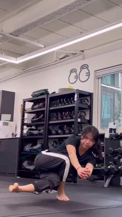 I'm still trying to figure out if she squatted one leg or two. My mind can't process it.