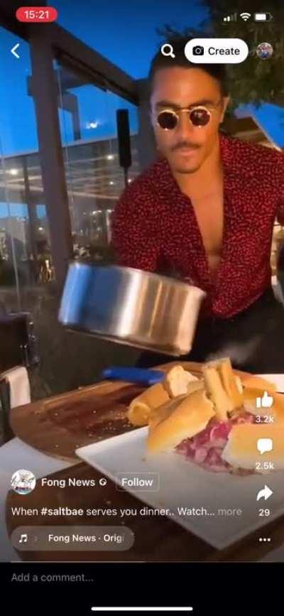 Steak thrown a plate and drowned in hot butter, on a plate with a bone and shitty quality bread added (because reasons), why it must be Salt Bae