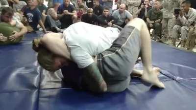 Jessamyn Duke taps out a guy - Girl Vs Guy Grappling