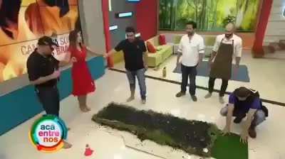 latina hostess walks on hot coals