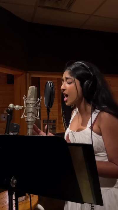 Maitreyi singing