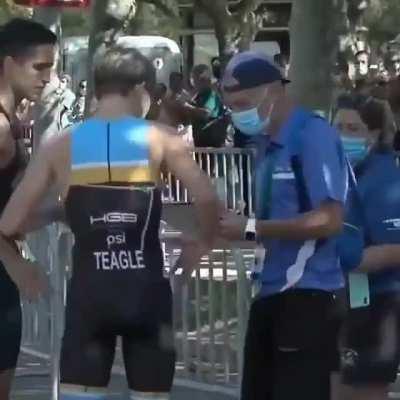 Heartwarming moment Spanish triathlete stops at the finish line to let his competitor take the bronze