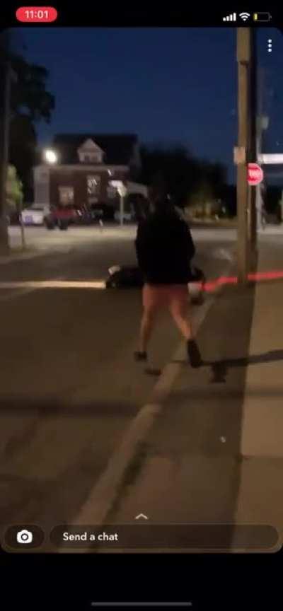 Riding a Scooter with Feet In the Air