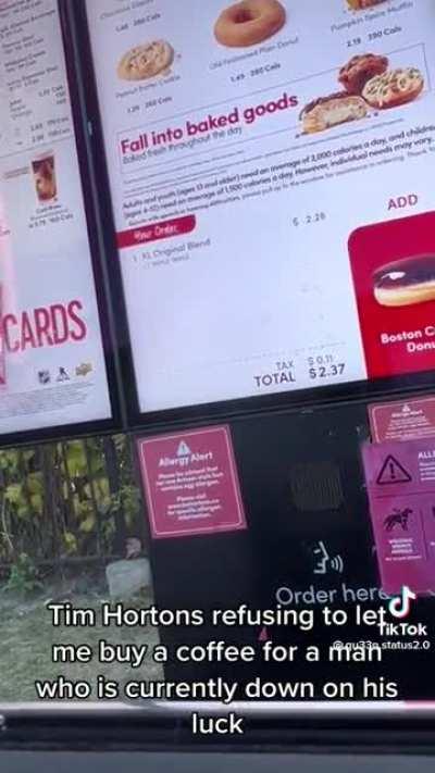 Tim Hortons employee refuses to let a woman buy a drink for a homeless man