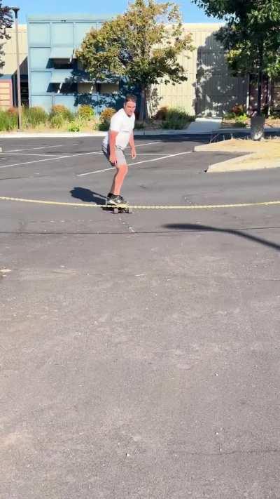 Jumping over a chain on a skateboard