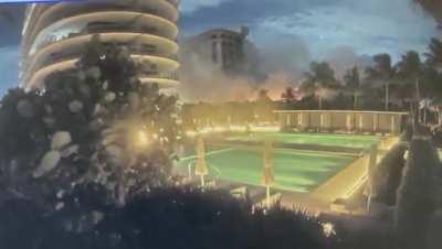 Security camera video of the building collapse sent to me from a neighbor.