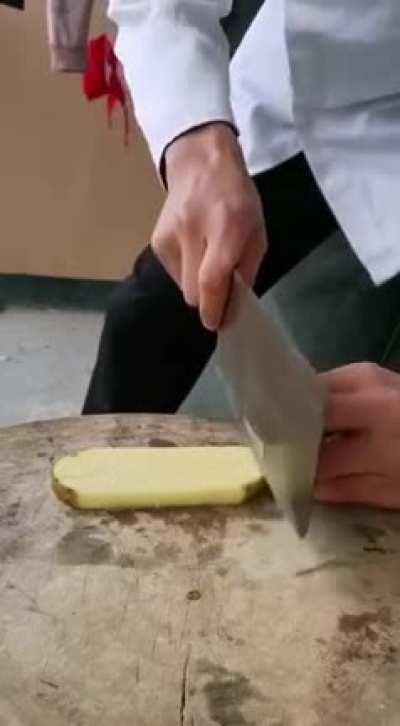 What This Guy Does To A Potato...