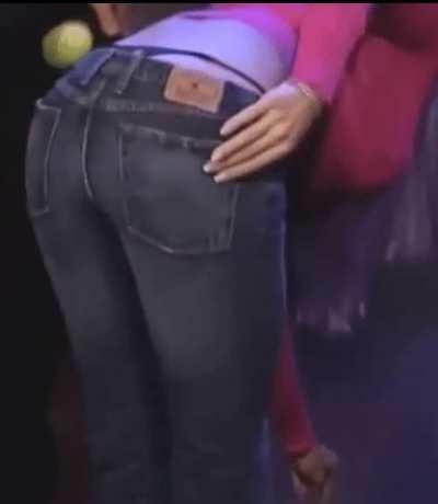 Torrie bending over on Howard Stern