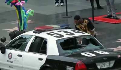 Man breaks Police car windows and steals laptops