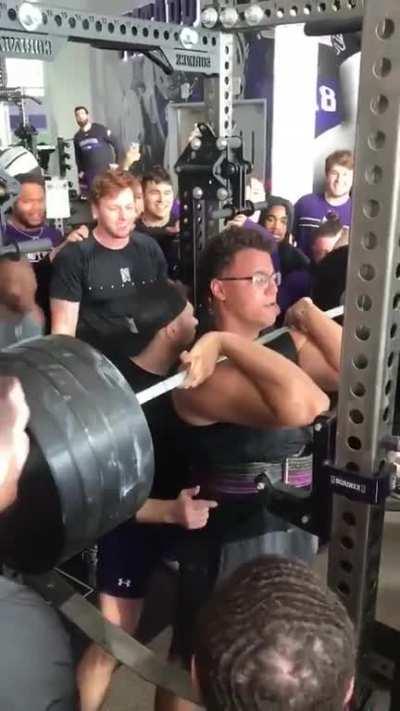 This guy squatted 450 pounds.