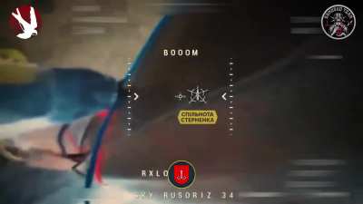 Footage of a Ukrainian FPV pilot attaching his quad to a Russian Zala Z-16 reconnaissance UAV and dragining it down to the ground.