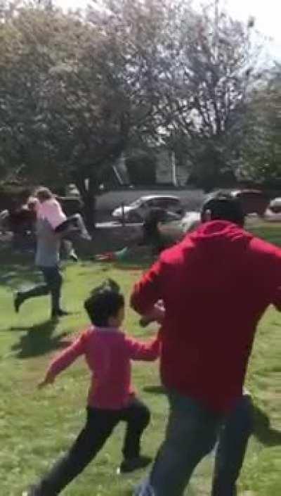 Dads racing while carrying their kids......