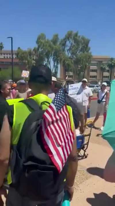 **UPDATE** AZ Gun Wielding Instigator second angle. Showing him throw the first punch at peaceful protesters at No Kings Rally