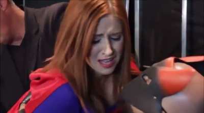Superheroine bearhugged and spanked