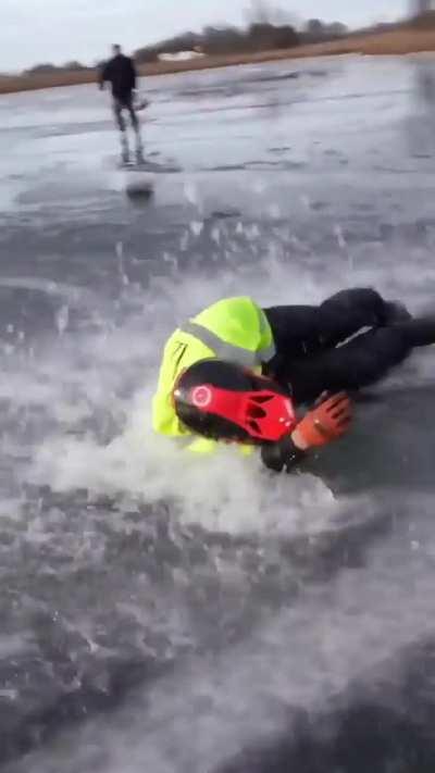 Riding a bike on thin sheet of ice 
