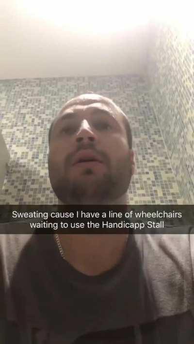 A line formed outside the handicapped stall