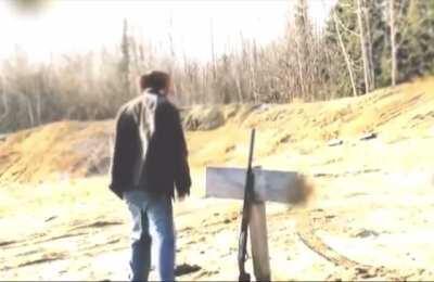 guys gun falls after setting it down on faulty post and shoots himself