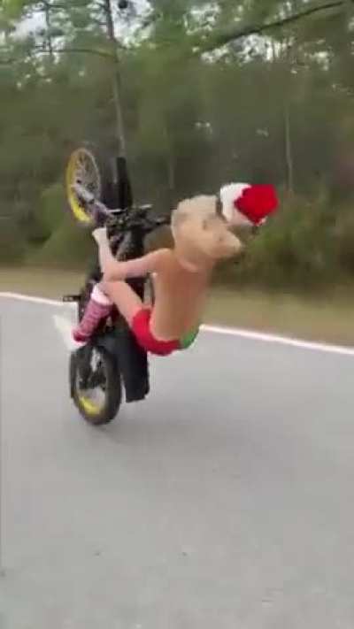 Trying to do a wheelie, ending up getting road rash and probably a concussion too.