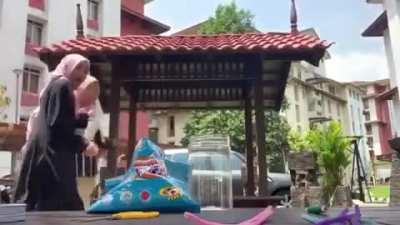 3 girls making a science project got disturb