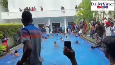 Sri Lanka protesters storm into the President's House and enjoy its pool