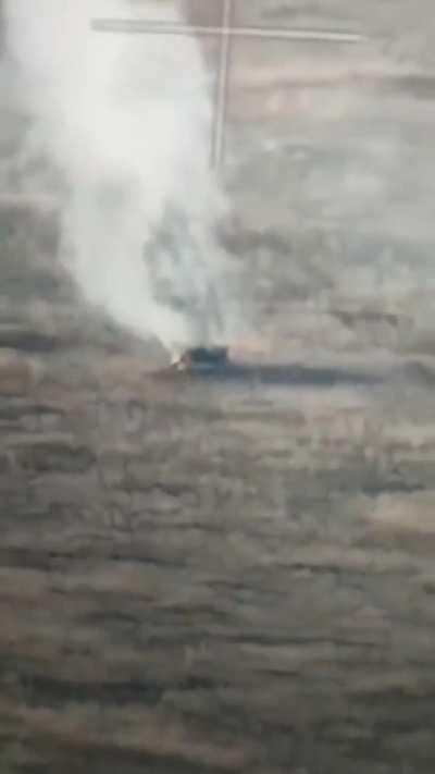 UA POV: Burning Russian vehicle moving through a field, infantry can be seen behind it, near Avdeevka