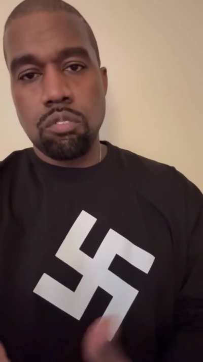 Kanye wearing swastika shirt