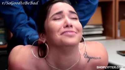 Bent over, eyes rolling