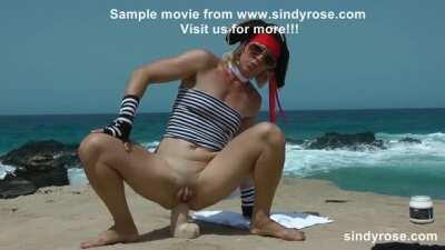 Anal pirate Sindy Rose ruin her ass with huge dildo on the beach