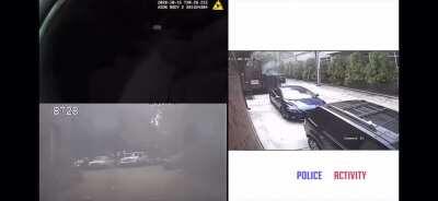 Man throws flaming torch into Seattle Police Department patrol car with officer inside