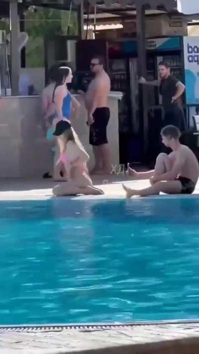 twerking for a video in a public pool.