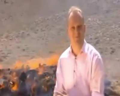 Reporting on authorities burning drugs while standing close