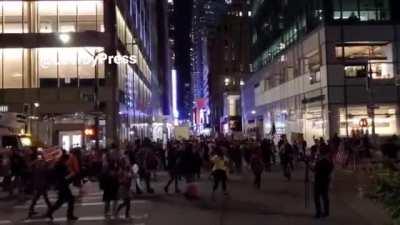 New Yorkers hit the streets tonight against vaccine mandates.