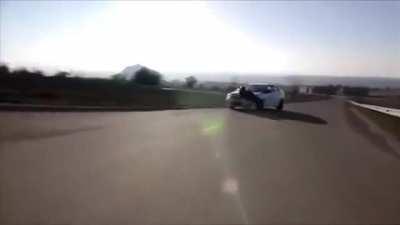 Speeding down the road and slamming into a car