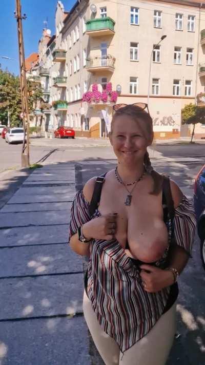 It's just an ordinary walk around the city in this extremely hot September. I had to show my tits because I was getting sleepy, and that always wake me up. Heh
