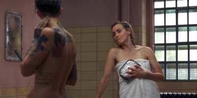 Ruby Rose (tattooed naked Aussie) and Taylor Schilling. OITNB. 2015
