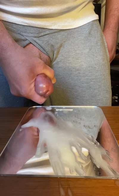 Shooting fresh ropes of sperm on a mirror in my basement 