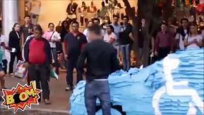 Guy's car gets covered with post-it notes after parking in a disabled space