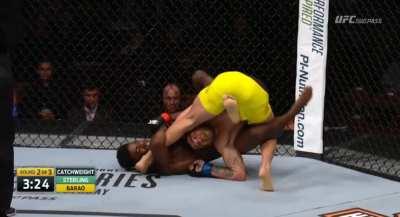 Renan Barao is taken down for the first time in his UFC career by Aljamain Sterling, who immediately takes his back and attempts a Suloev Stretch