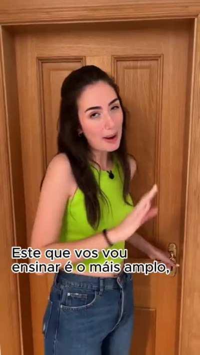 Typical woman from Uruguay showing her house