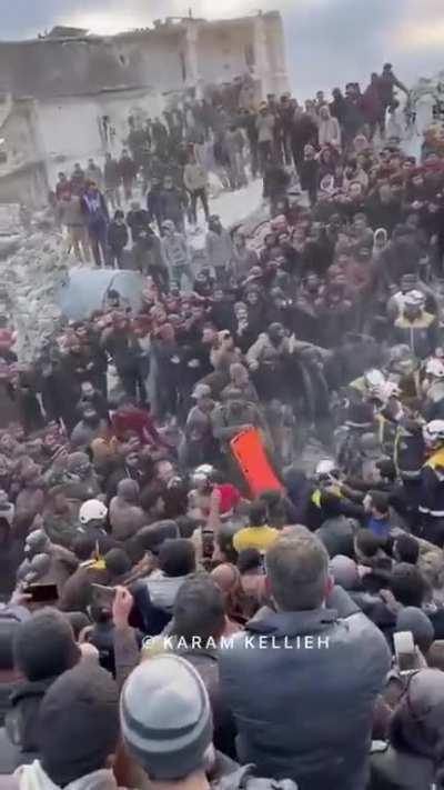 40 hours after the earthquake an entire family was pulled out alive and safe from underneath the rubble of the earthquake in Syria.