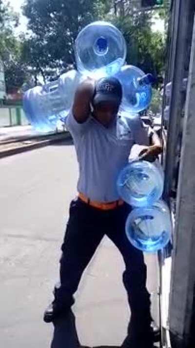 Skinny guy can carry 5 (5 gallons) water bottles at a time.