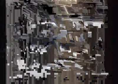 Russian FPV drone operator targets a Ukrainian soldier hiding inside an abandoned barn