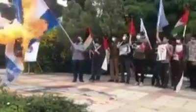 Setting a flag on fire