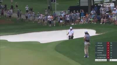 Phil Mickelson takes four shots to get out of a bunker