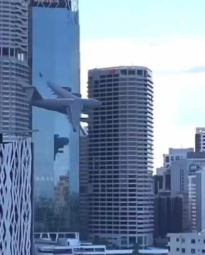 Flying a Boeing C-17 Globemaster through the middle of the city.