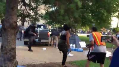 Cops steal protesters' water and dump milk