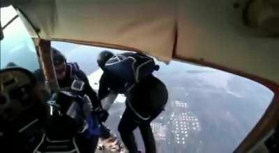 Two planes crash into each other with skydivers